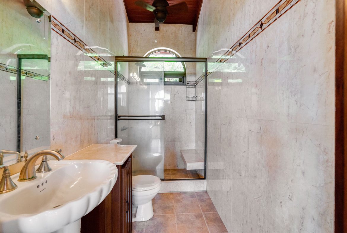 OCEAN VIEW ESTATE HOME WITH GUEST BUNGALOW, CARETAKER HOME, FRUIT TREES, AND WATERFALL – 3.47 ACRES