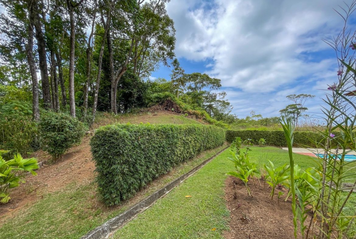 SOLID CONSTRUCTION HOME WITH BEAUFITUL JUNGLE VIEWS IN OJOCHAL – 0.36 ACRES