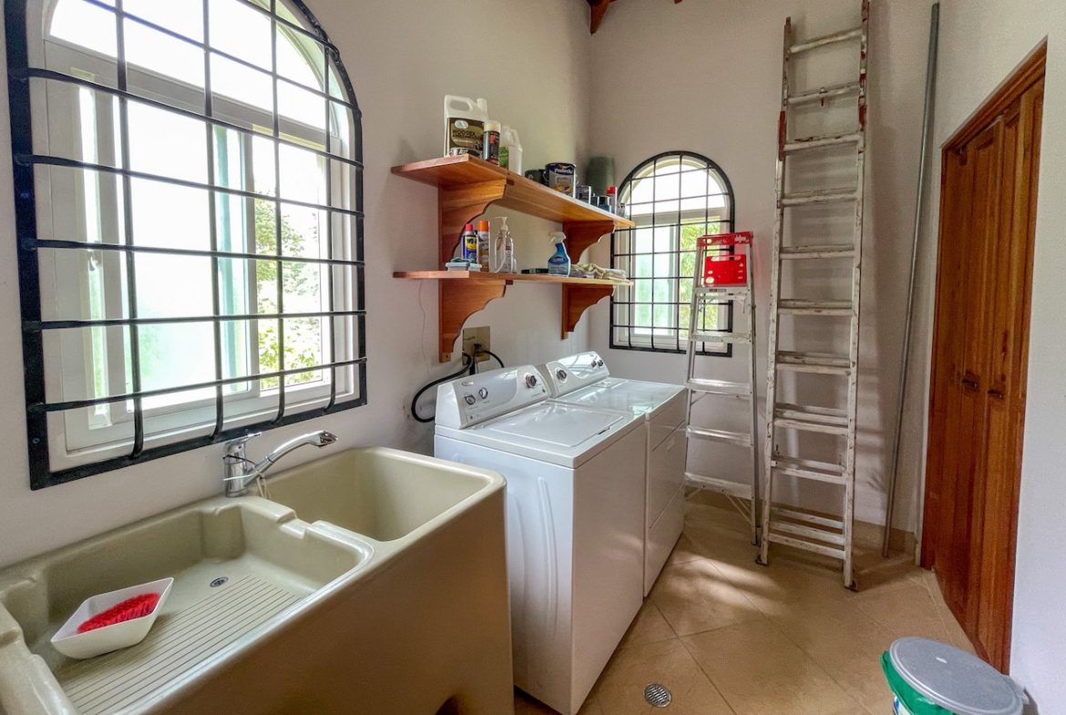 SOLID CONSTRUCTION HOME WITH BEAUFITUL JUNGLE VIEWS IN OJOCHAL – 0.36 ACRES