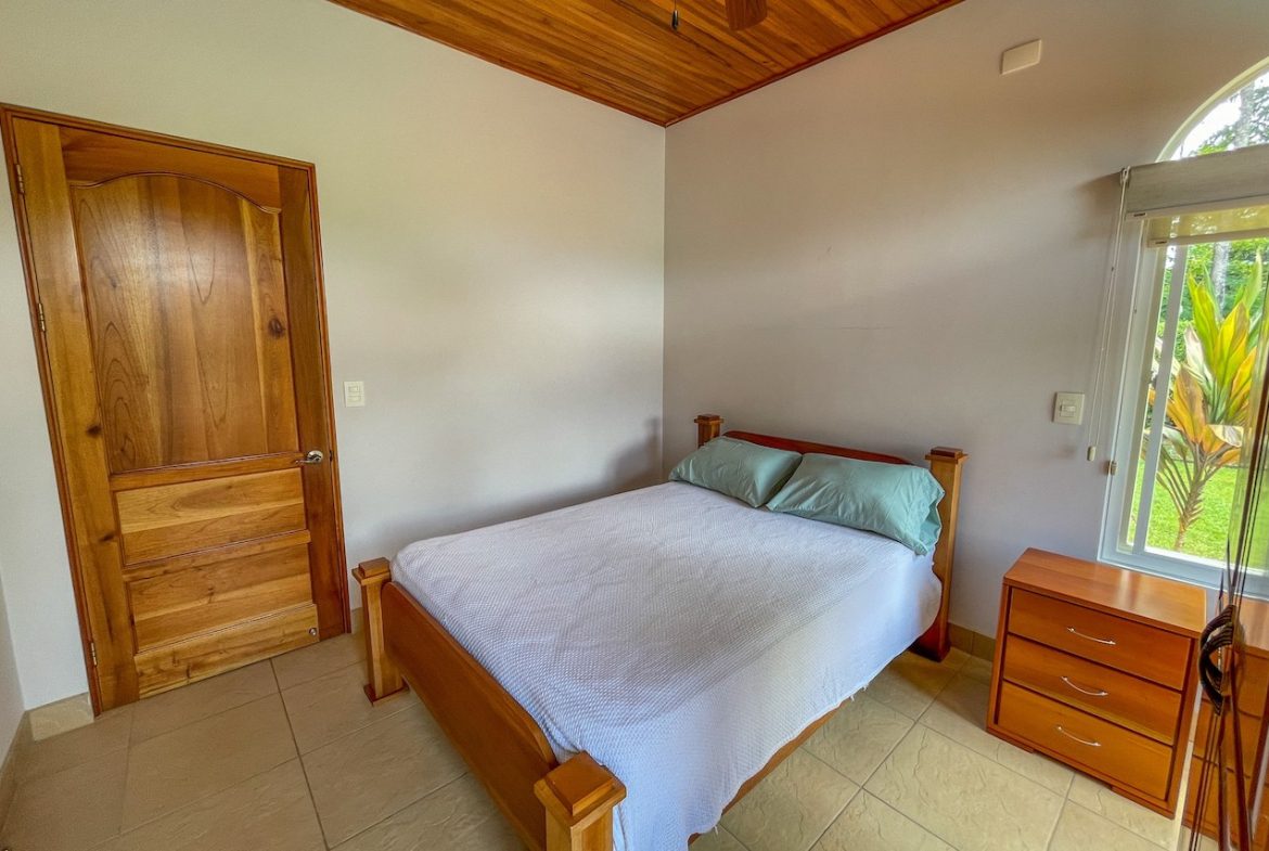 SOLID CONSTRUCTION HOME WITH BEAUFITUL JUNGLE VIEWS IN OJOCHAL – 0.36 ACRES