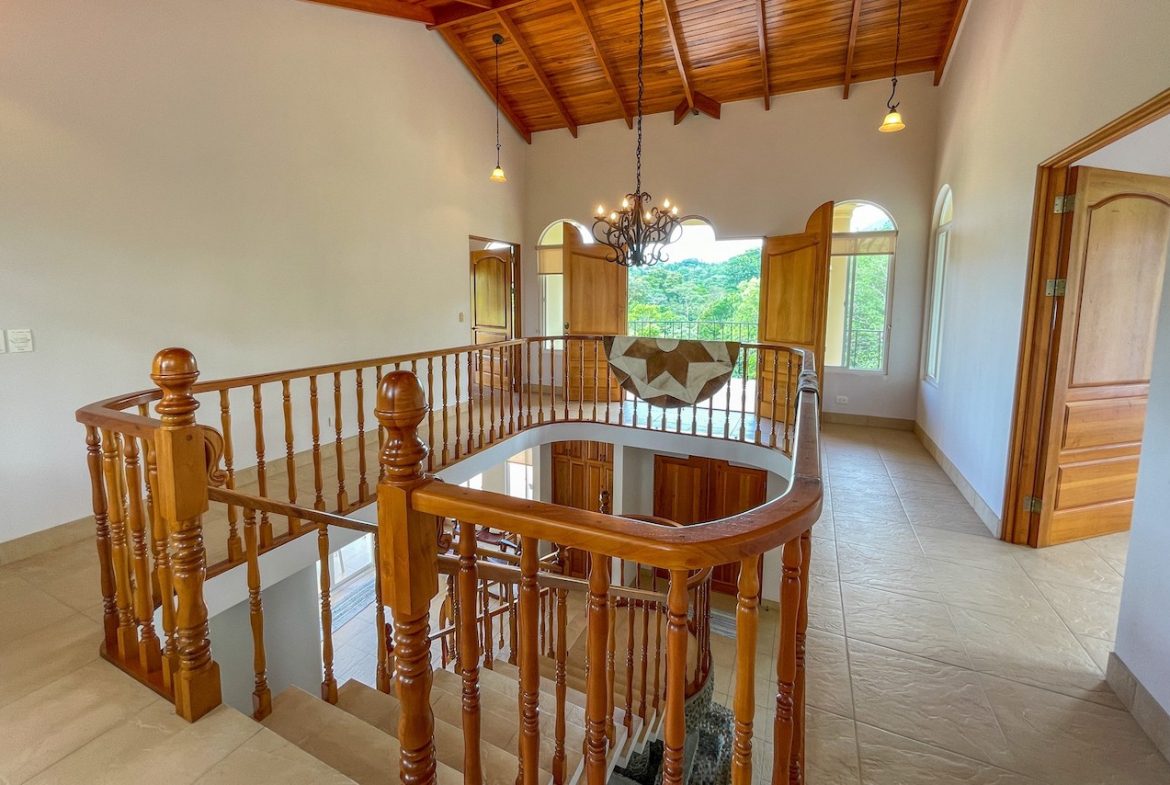 SOLID CONSTRUCTION HOME WITH BEAUFITUL JUNGLE VIEWS IN OJOCHAL – 0.36 ACRES