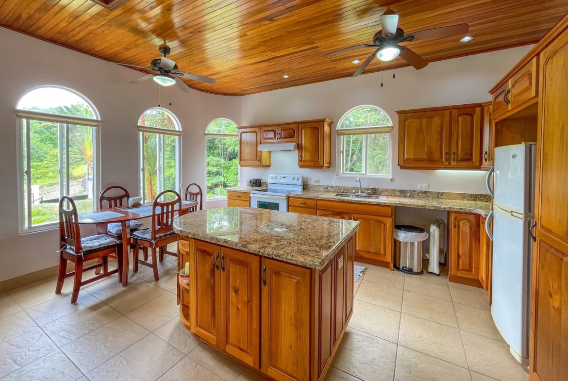 SOLID CONSTRUCTION HOME WITH BEAUFITUL JUNGLE VIEWS IN OJOCHAL – 0.36 ACRES