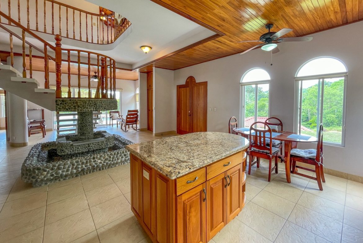 SOLID CONSTRUCTION HOME WITH BEAUFITUL JUNGLE VIEWS IN OJOCHAL – 0.36 ACRES
