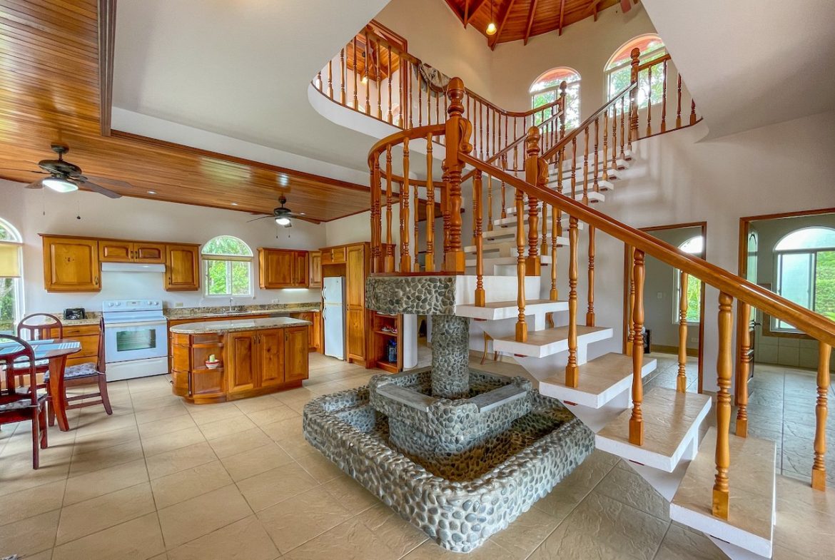 SOLID CONSTRUCTION HOME WITH BEAUFITUL JUNGLE VIEWS IN OJOCHAL – 0.36 ACRES