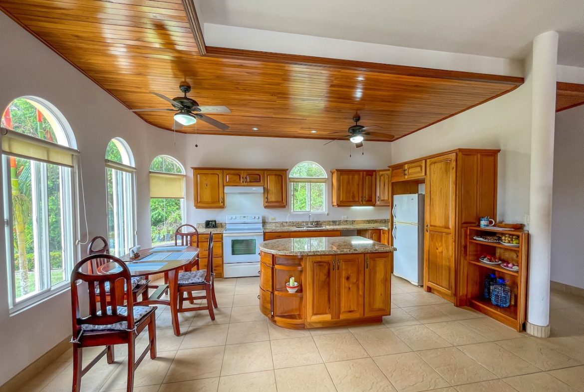 SOLID CONSTRUCTION HOME WITH BEAUFITUL JUNGLE VIEWS IN OJOCHAL – 0.36 ACRES