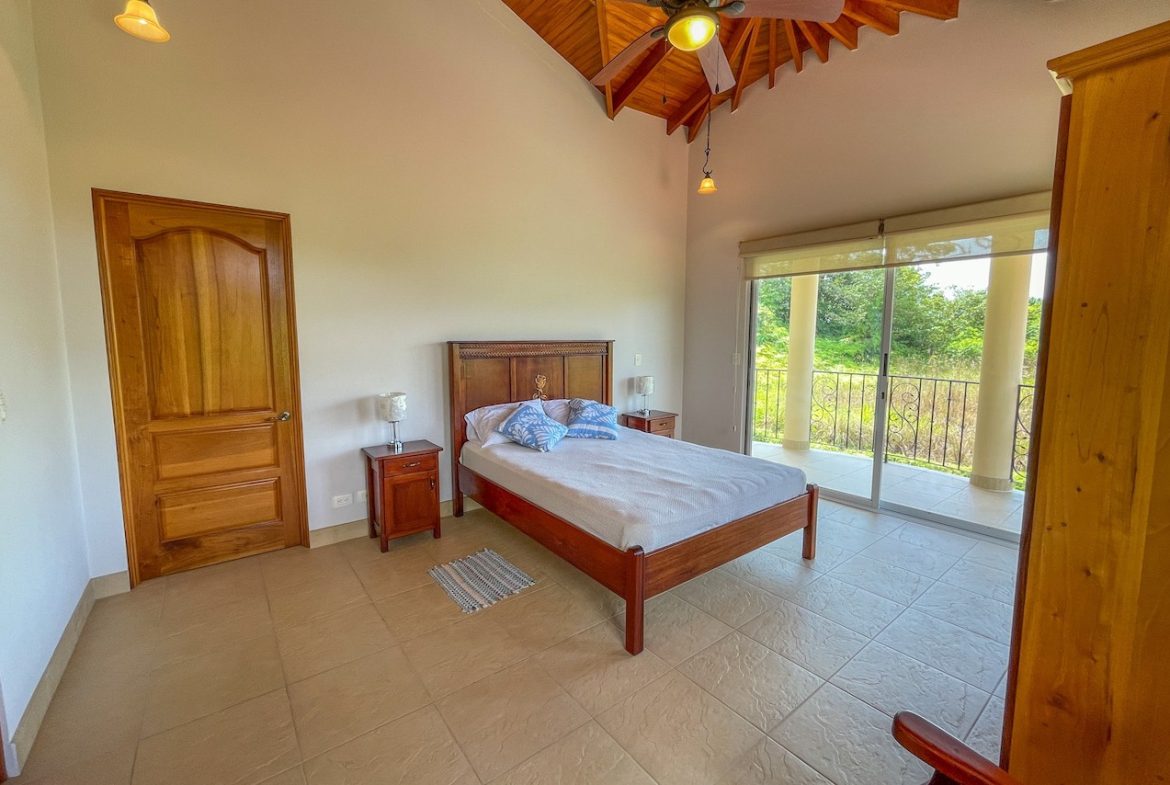 SOLID CONSTRUCTION HOME WITH BEAUFITUL JUNGLE VIEWS IN OJOCHAL – 0.36 ACRES