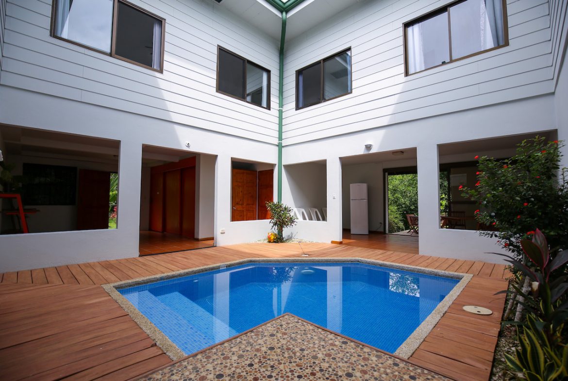 HOME AND APARTMENT WALKING DISTANCE TO THE BEACH – 1.3 ACRES