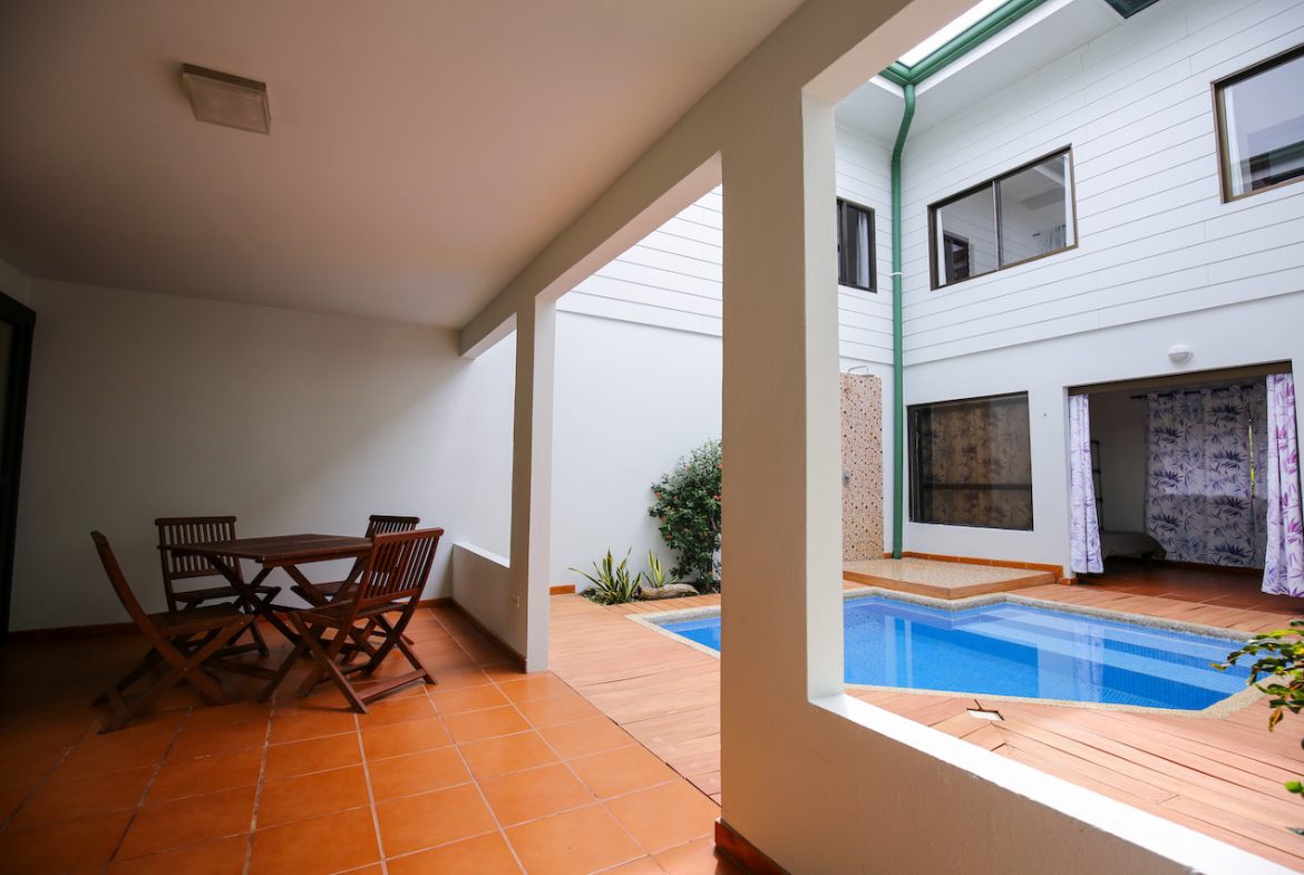 HOME AND APARTMENT WALKING DISTANCE TO THE BEACH – 1.3 ACRES