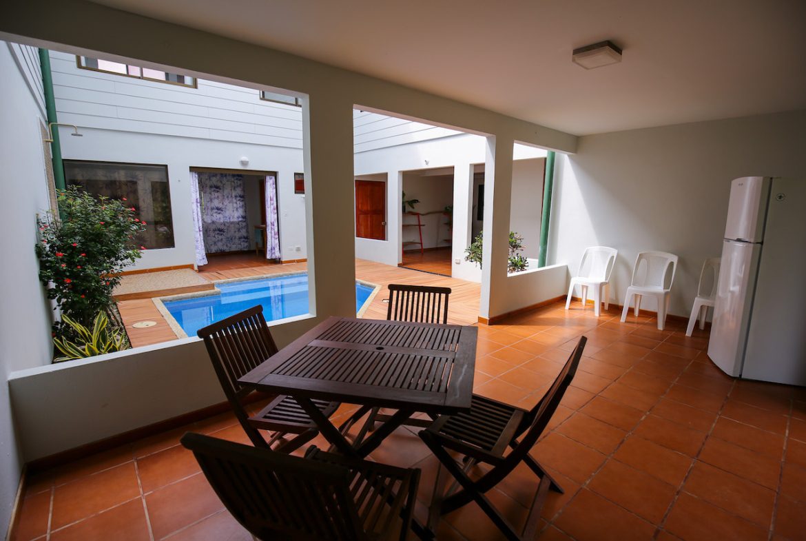 HOME AND APARTMENT WALKING DISTANCE TO THE BEACH – 1.3 ACRES