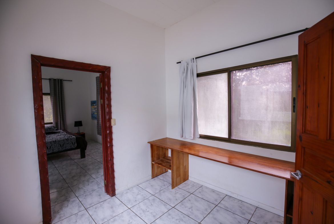 HOME AND APARTMENT WALKING DISTANCE TO THE BEACH – 1.3 ACRES