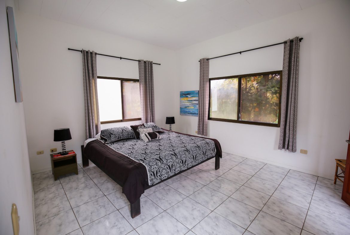 HOME AND APARTMENT WALKING DISTANCE TO THE BEACH – 1.3 ACRES