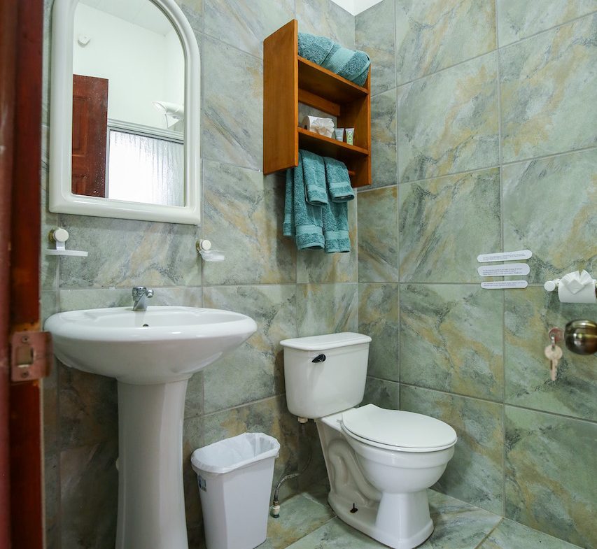 HOME AND APARTMENT WALKING DISTANCE TO THE BEACH – 1.3 ACRES