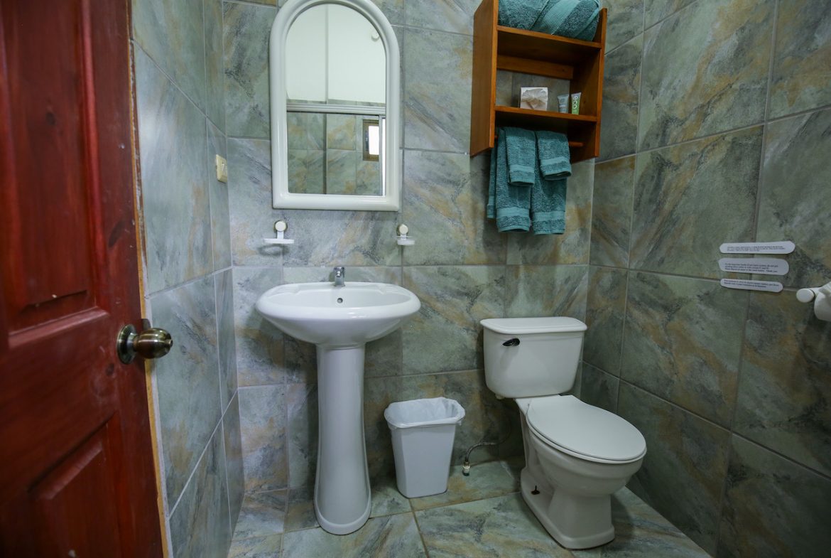 HOME AND APARTMENT WALKING DISTANCE TO THE BEACH – 1.3 ACRES