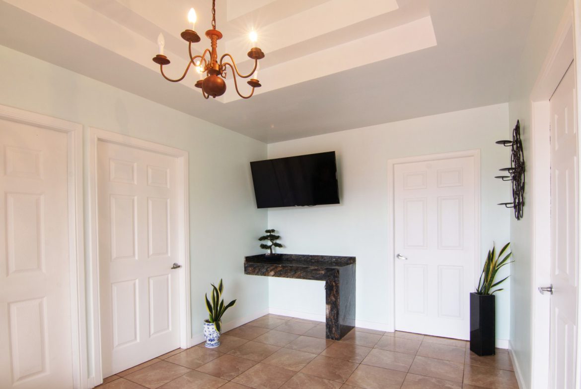 SPACIOUS TWO-STORY HOME WITH MOUNTAIN VIEWS, OUTDOOR LIVING, AND GREENHOUSE – 0.25 ACRES