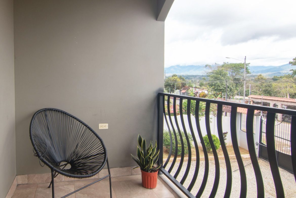 SPACIOUS TWO-STORY HOME WITH MOUNTAIN VIEWS, OUTDOOR LIVING, AND GREENHOUSE – 0.25 ACRES