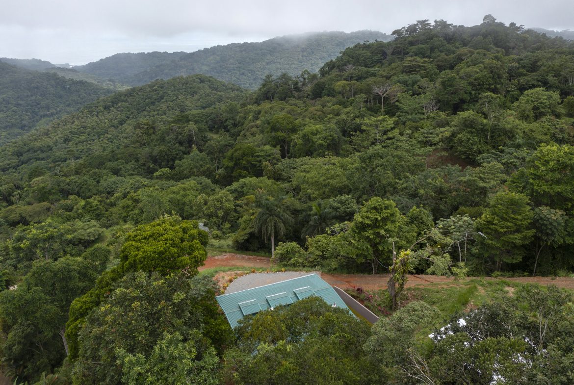 STUNNING MOUNTAIN HOME WITH OCEAN VIEWS IN GATED COMMUNITY – PRIVACY, LUXURY, AND EXPANSION POTENTIAL – 2 ACRES