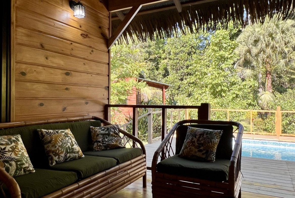 TROPICAL WOODEN STILT HOME IN OJOCHAL – RUSTIC CHARM & INVESTMENT POTENTIAL – 0.5 ACRES