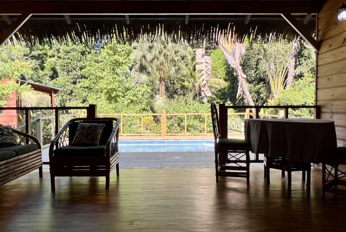 TROPICAL WOODEN STILT HOME IN OJOCHAL – RUSTIC CHARM & INVESTMENT POTENTIAL – 0.5 ACRES
