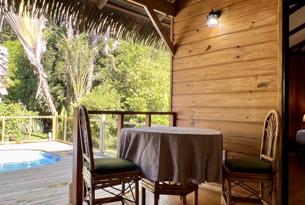 TROPICAL WOODEN STILT HOME IN OJOCHAL – RUSTIC CHARM & INVESTMENT POTENTIAL – 0.5 ACRES