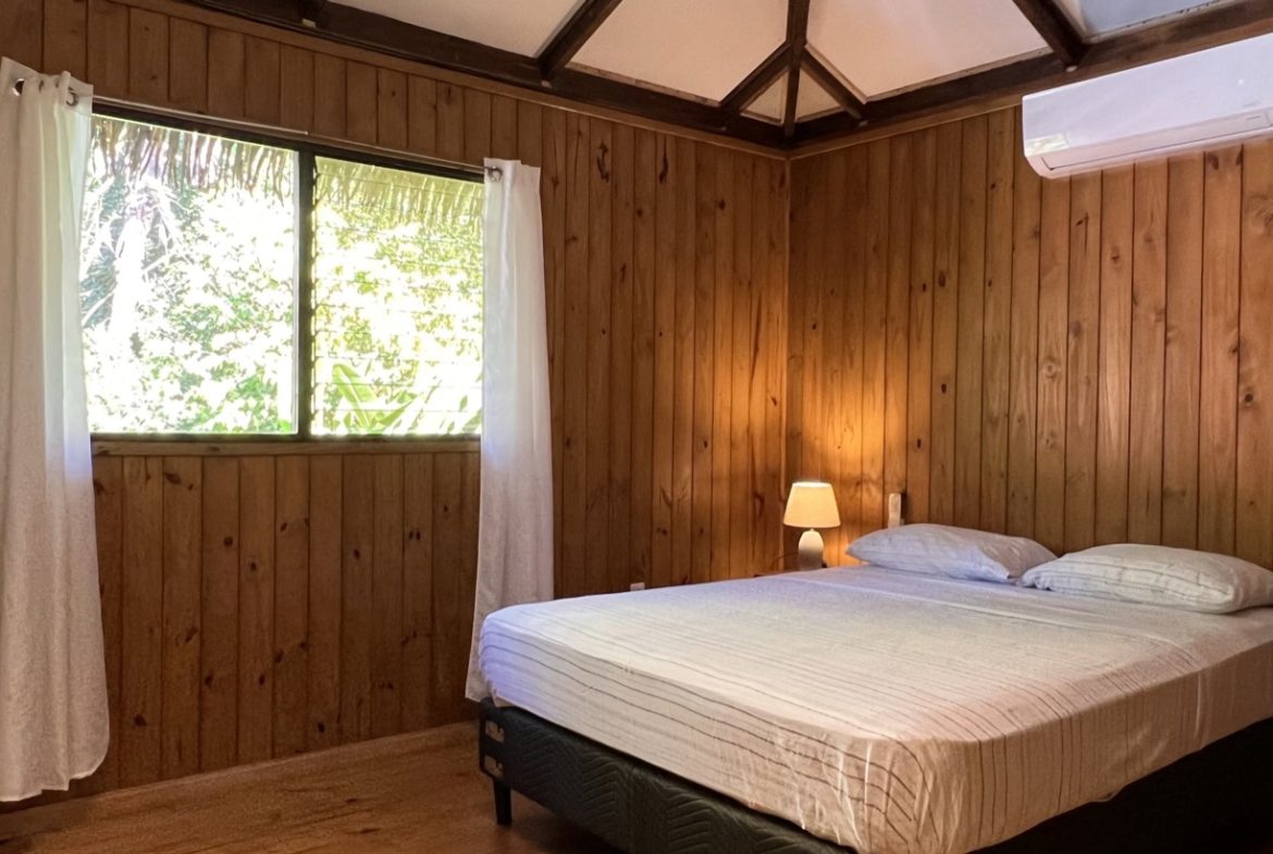 TROPICAL WOODEN STILT HOME IN OJOCHAL – RUSTIC CHARM & INVESTMENT POTENTIAL – 0.5 ACRES