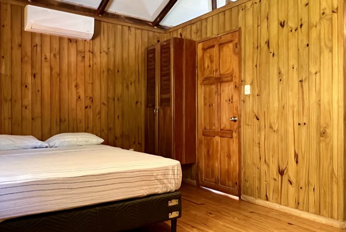 TROPICAL WOODEN STILT HOME IN OJOCHAL – RUSTIC CHARM & INVESTMENT POTENTIAL – 0.5 ACRES