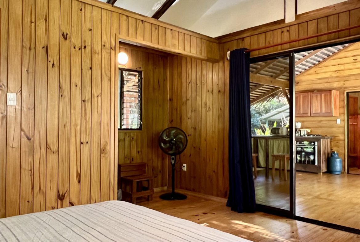 TROPICAL WOODEN STILT HOME IN OJOCHAL – RUSTIC CHARM & INVESTMENT POTENTIAL – 0.5 ACRES