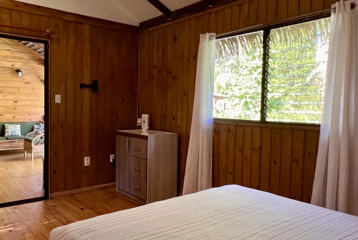 TROPICAL WOODEN STILT HOME IN OJOCHAL – RUSTIC CHARM & INVESTMENT POTENTIAL – 0.5 ACRES