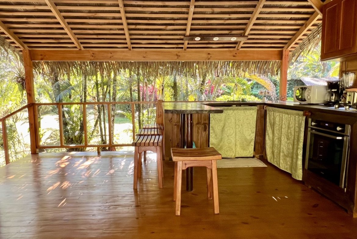 TROPICAL WOODEN STILT HOME IN OJOCHAL – RUSTIC CHARM & INVESTMENT POTENTIAL – 0.5 ACRES