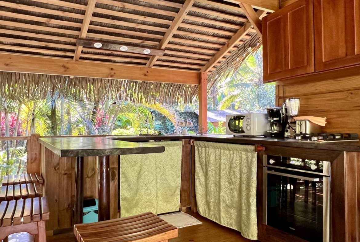 TROPICAL WOODEN STILT HOME IN OJOCHAL – RUSTIC CHARM & INVESTMENT POTENTIAL – 0.5 ACRES