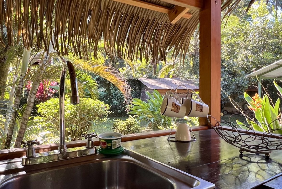 TROPICAL WOODEN STILT HOME IN OJOCHAL – RUSTIC CHARM & INVESTMENT POTENTIAL – 0.5 ACRES