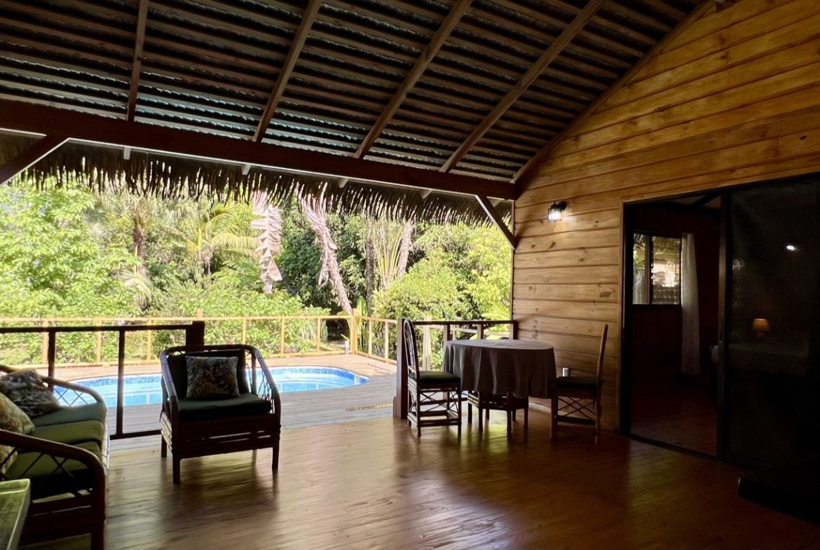 TROPICAL WOODEN STILT HOME IN OJOCHAL – RUSTIC CHARM & INVESTMENT POTENTIAL – 0.5 ACRES