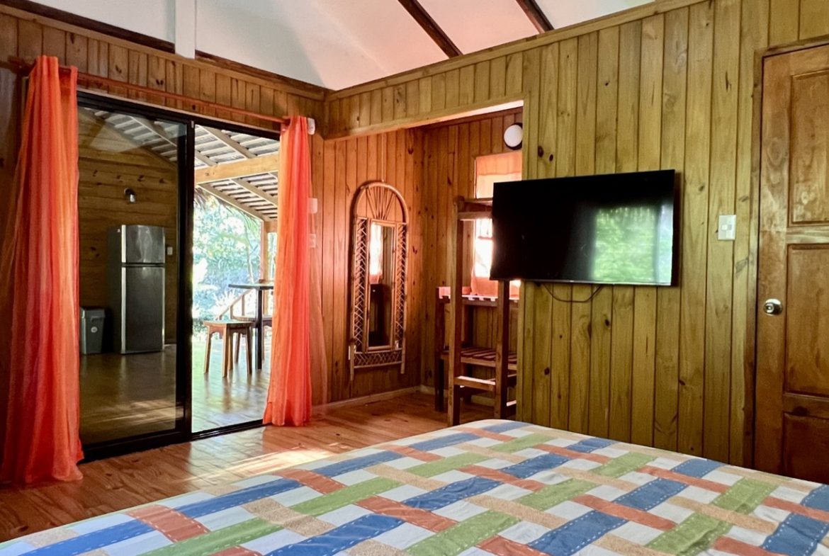 TROPICAL WOODEN STILT HOME IN OJOCHAL – RUSTIC CHARM & INVESTMENT POTENTIAL – 0.5 ACRES