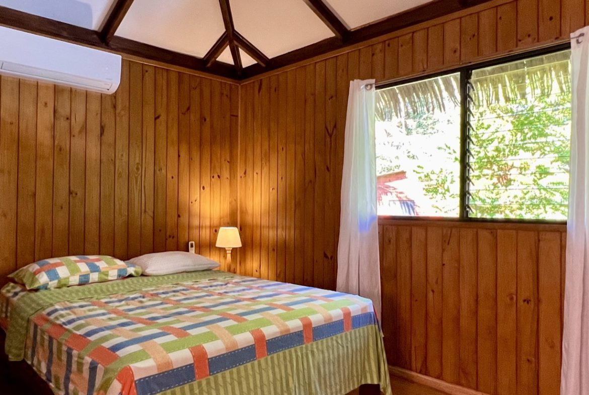 TROPICAL WOODEN STILT HOME IN OJOCHAL – RUSTIC CHARM & INVESTMENT POTENTIAL – 0.5 ACRES
