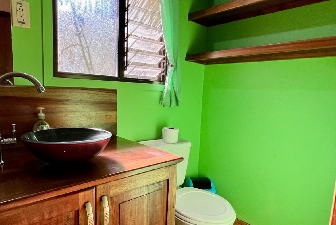 TROPICAL WOODEN STILT HOME IN OJOCHAL – RUSTIC CHARM & INVESTMENT POTENTIAL – 0.5 ACRES