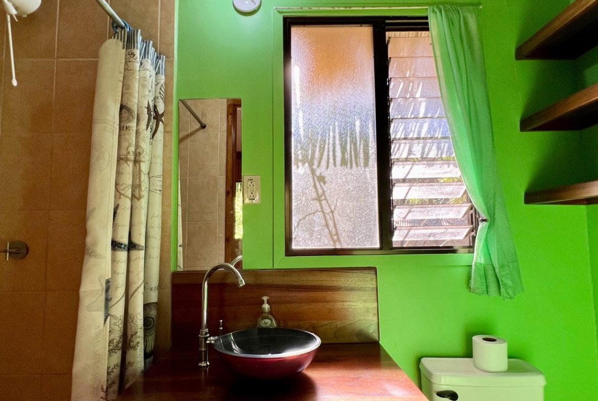 TROPICAL WOODEN STILT HOME IN OJOCHAL – RUSTIC CHARM & INVESTMENT POTENTIAL – 0.5 ACRES