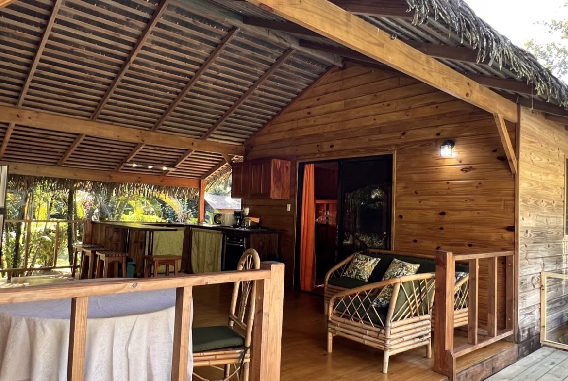 TROPICAL WOODEN STILT HOME IN OJOCHAL – RUSTIC CHARM & INVESTMENT POTENTIAL – 0.5 ACRES