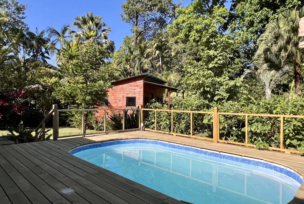 TROPICAL WOODEN STILT HOME IN OJOCHAL – RUSTIC CHARM & INVESTMENT POTENTIAL – 0.5 ACRES