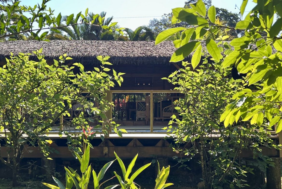 TROPICAL WOODEN STILT HOME IN OJOCHAL – RUSTIC CHARM & INVESTMENT POTENTIAL – 0.5 ACRES