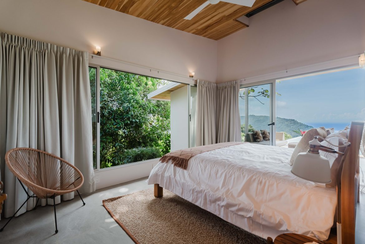 STUNNING MOUNTAIN HOME WITH OCEAN VIEWS IN GATED COMMUNITY – PRIVACY, LUXURY, AND EXPANSION POTENTIAL – 2 ACRES