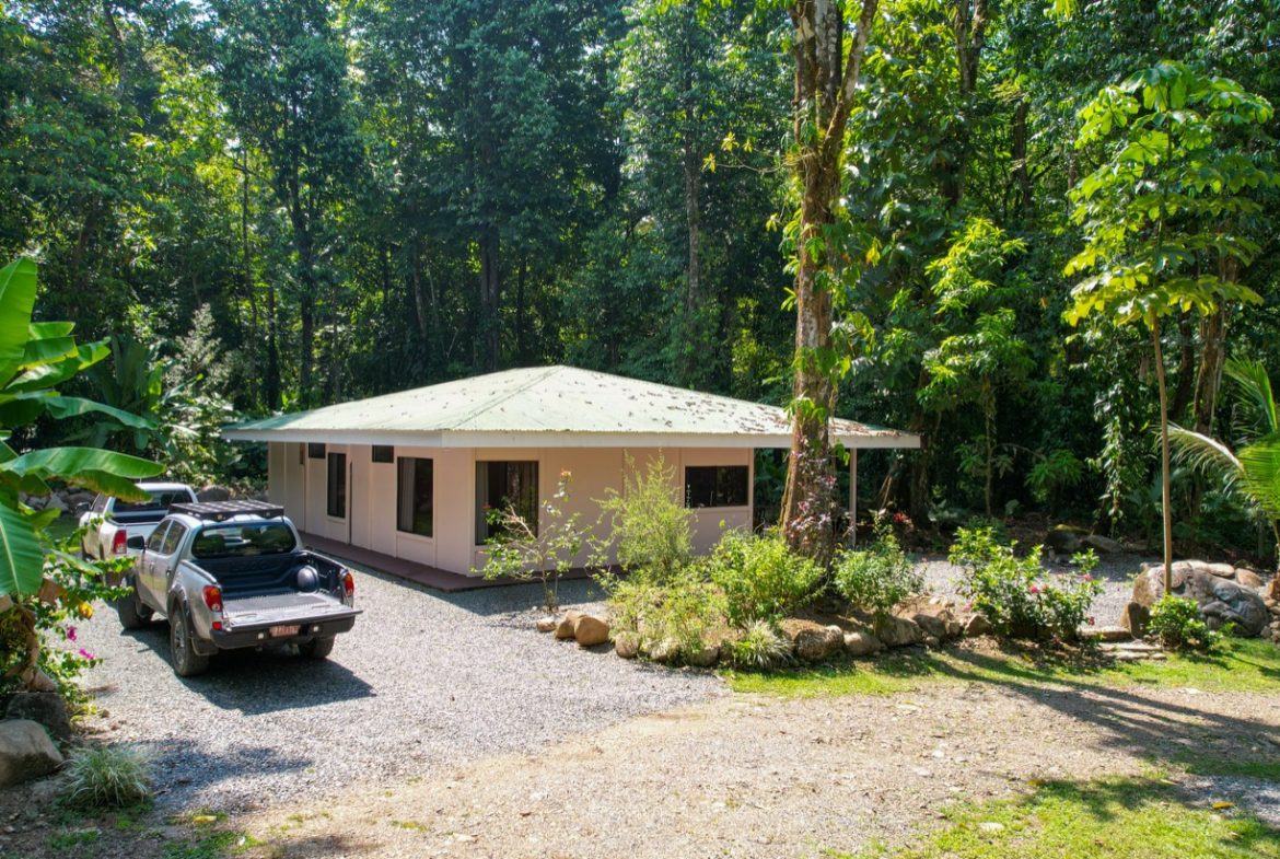 TROPICAL RIVERFRONT ESTATE IN CINCO VENTANAS – 5.65 ACRES WITH MULTIPLE HOMES, BUILD SITES & JUNGLE OASIS