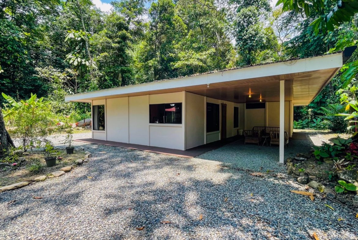 TROPICAL RIVERFRONT ESTATE IN CINCO VENTANAS – 5.65 ACRES WITH MULTIPLE HOMES, BUILD SITES & JUNGLE OASIS
