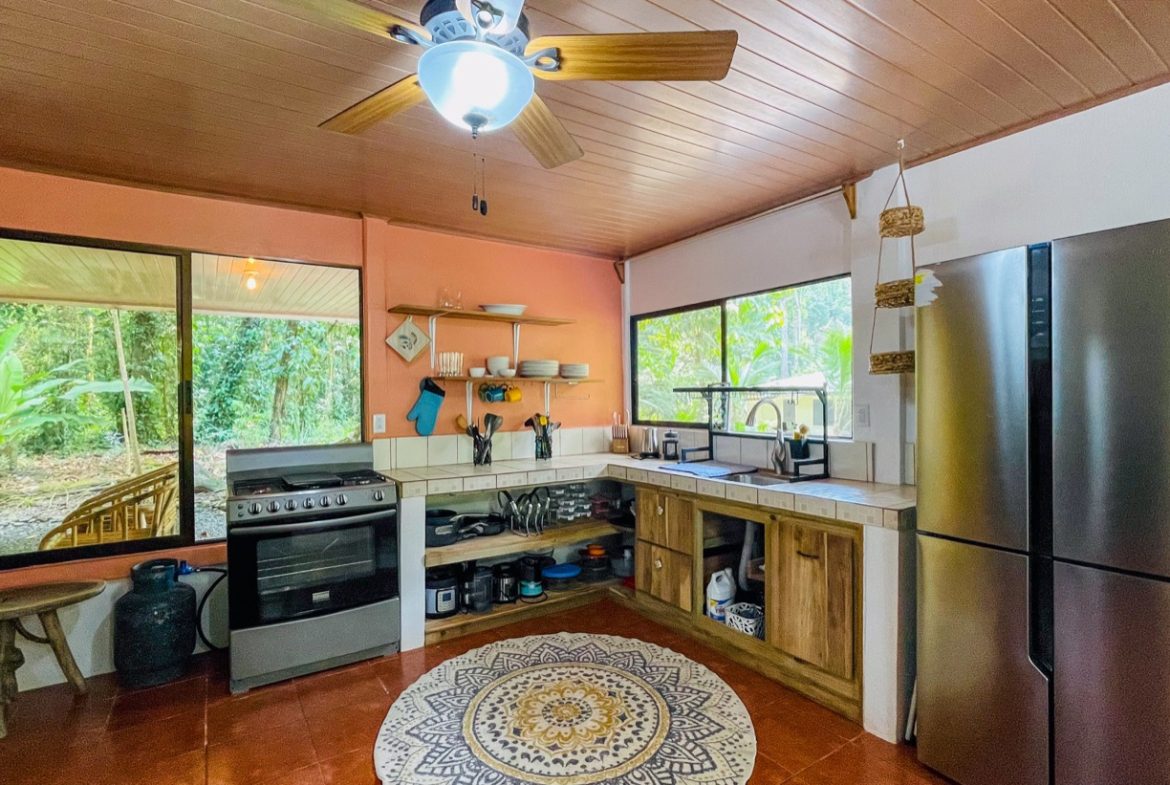 TROPICAL RIVERFRONT ESTATE IN CINCO VENTANAS – 5.65 ACRES WITH MULTIPLE HOMES, BUILD SITES & JUNGLE OASIS