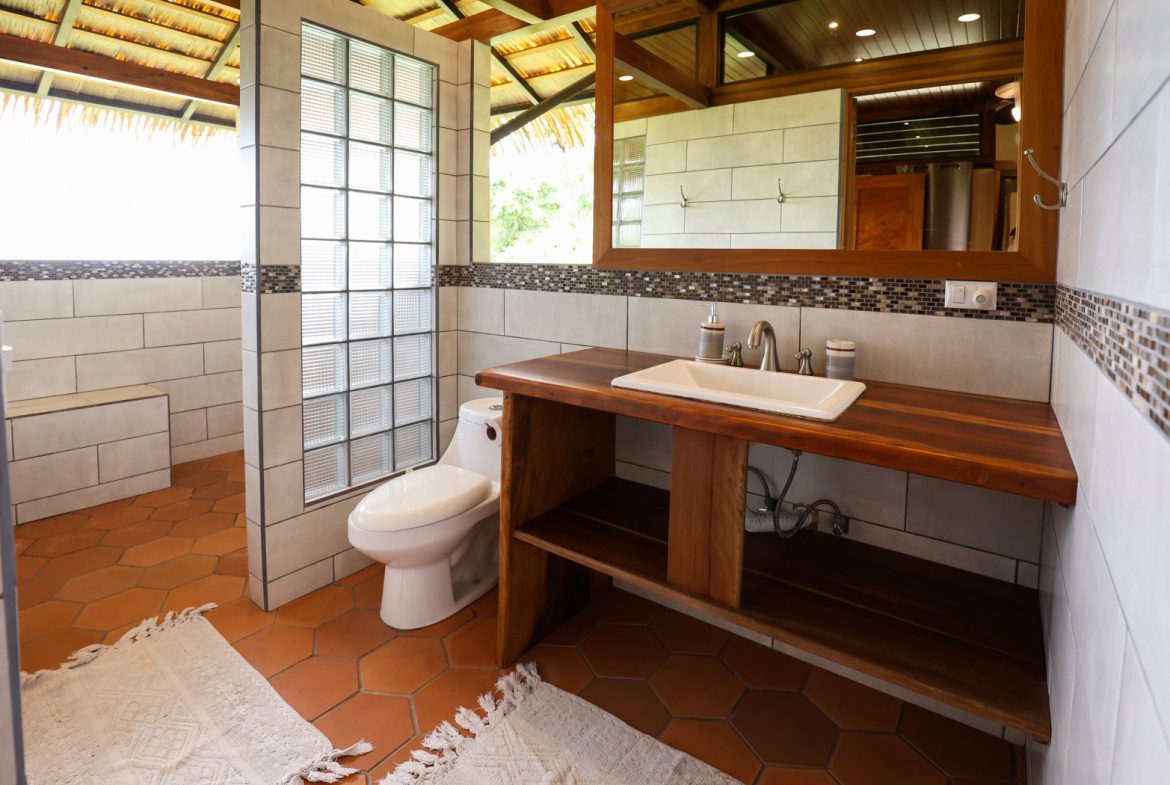 TROPICAL RETREAT IN PLATANILLO – OCEAN VIEW HOME PLUS APARTMENT IN ESTABLISHED COMMUNITY – 0.88 ACRES