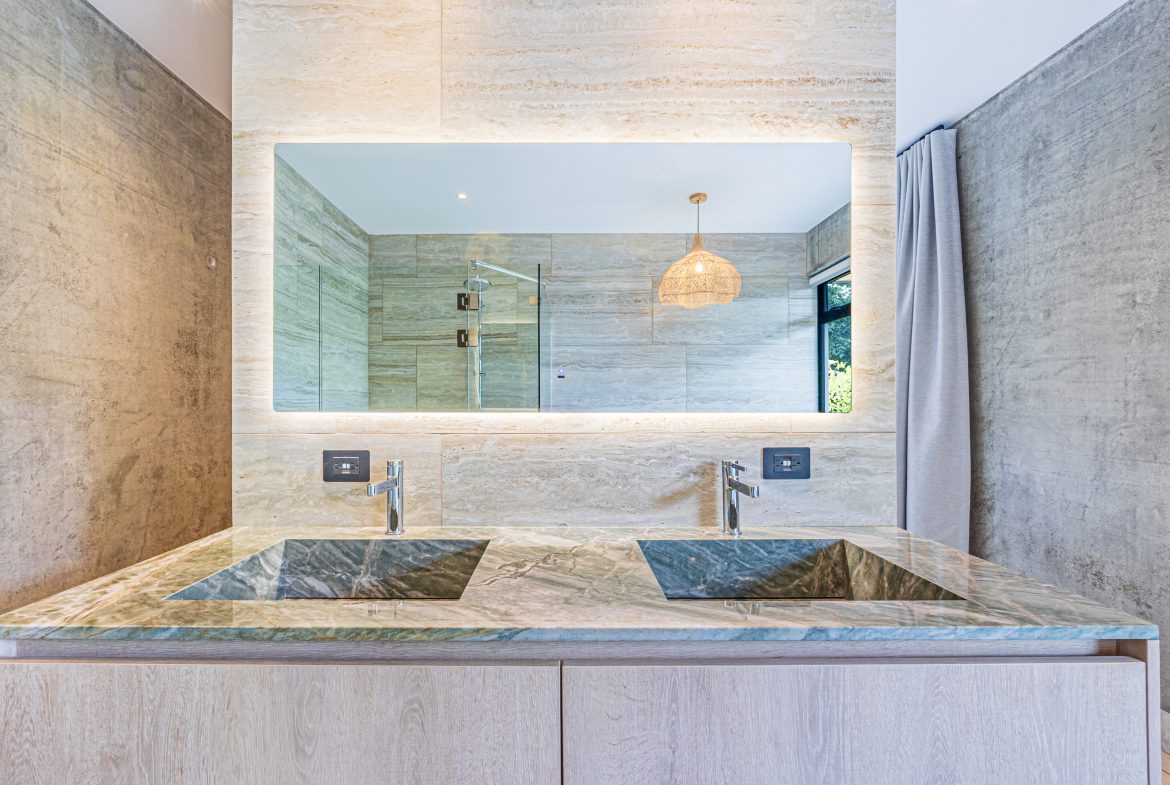 New contemporary tropical villa boasts with a movie theater and views of the iconic whale’s tail
