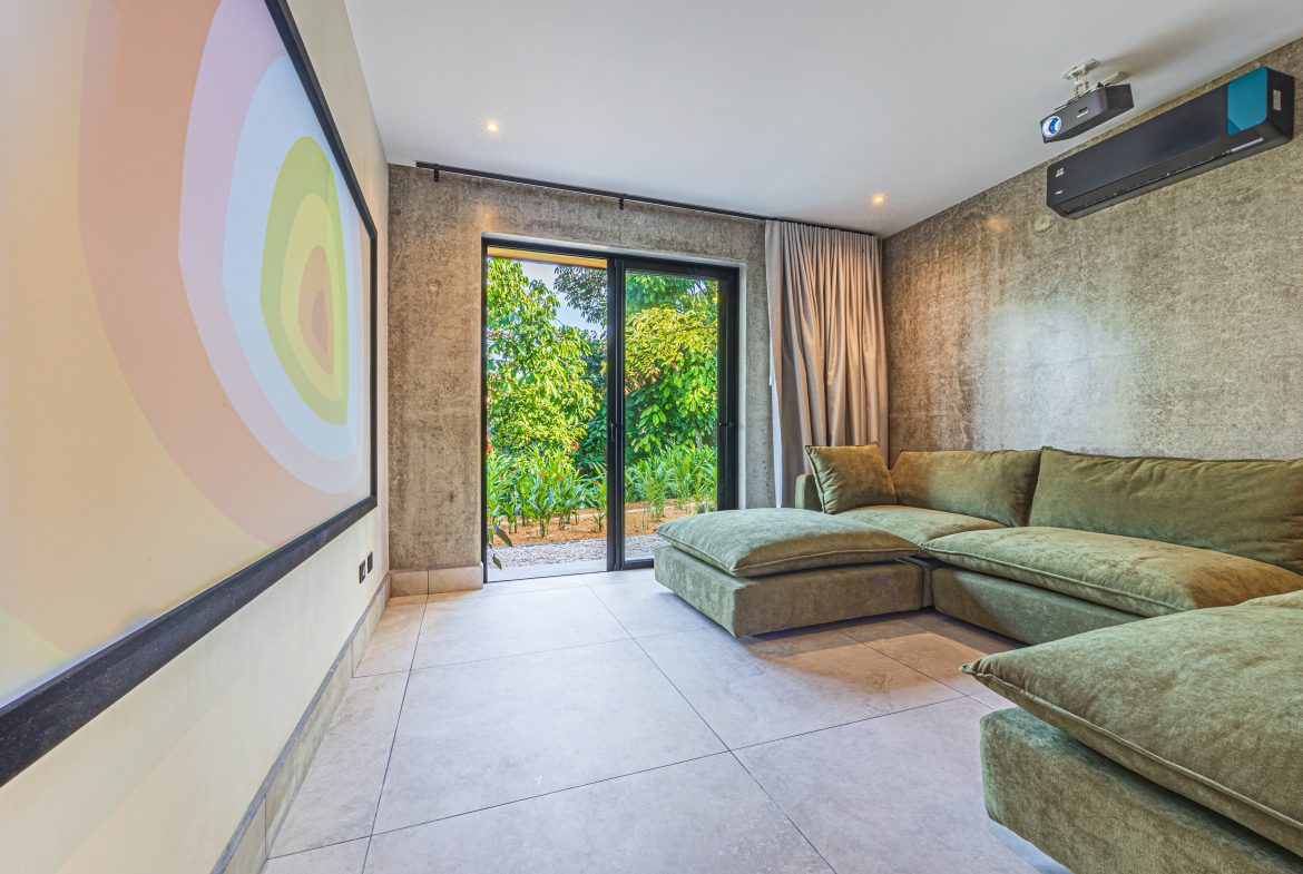 New contemporary tropical villa boasts with a movie theater and views of the iconic whale’s tail