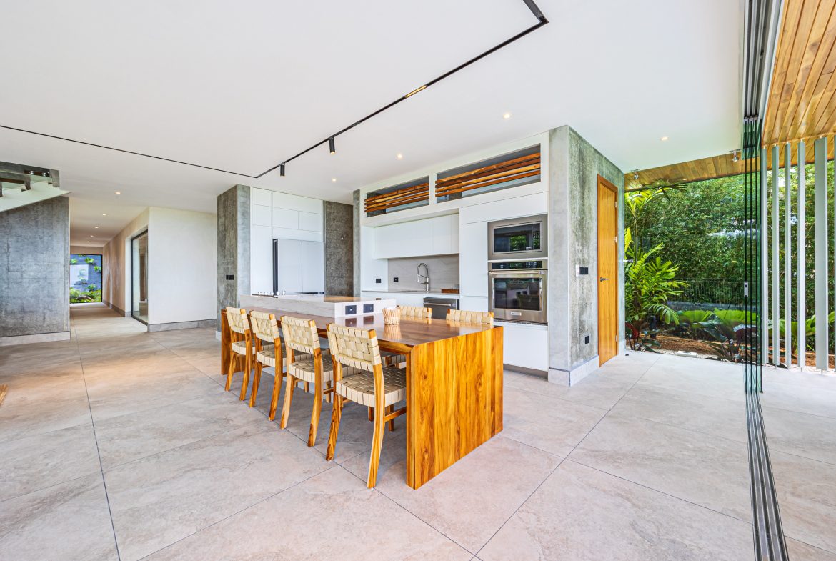 New contemporary tropical villa boasts with a movie theater and views of the iconic whale’s tail