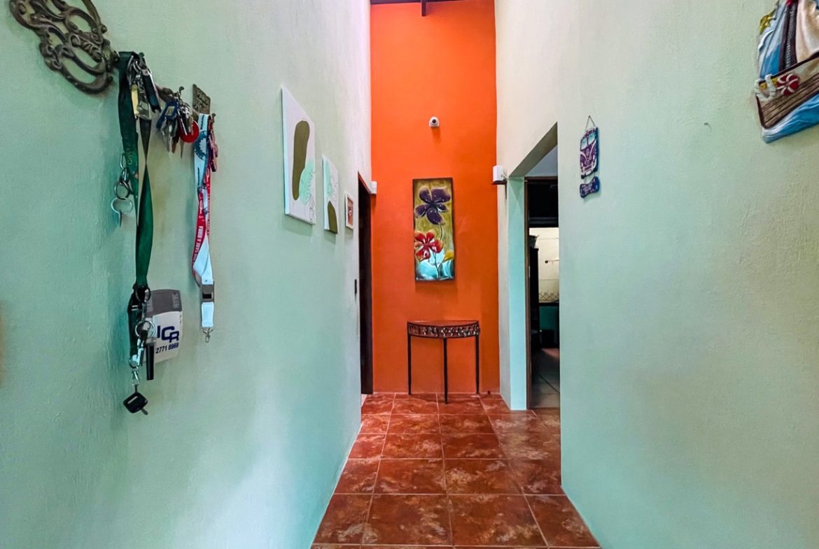 PROPERTY WITH THREE BEDROOM HOME AND PUBLIC ROAD IN FRONT, IN UVITA – 0.24 ACRES