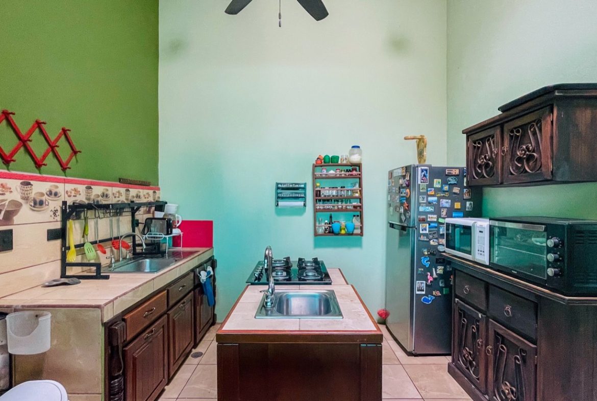 PROPERTY WITH THREE BEDROOM HOME AND PUBLIC ROAD IN FRONT, IN UVITA – 0.24 ACRES