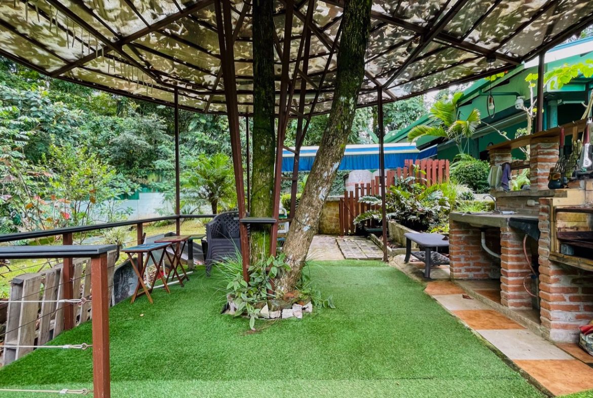 PROPERTY WITH THREE BEDROOM HOME AND PUBLIC ROAD IN FRONT, IN UVITA – 0.24 ACRES