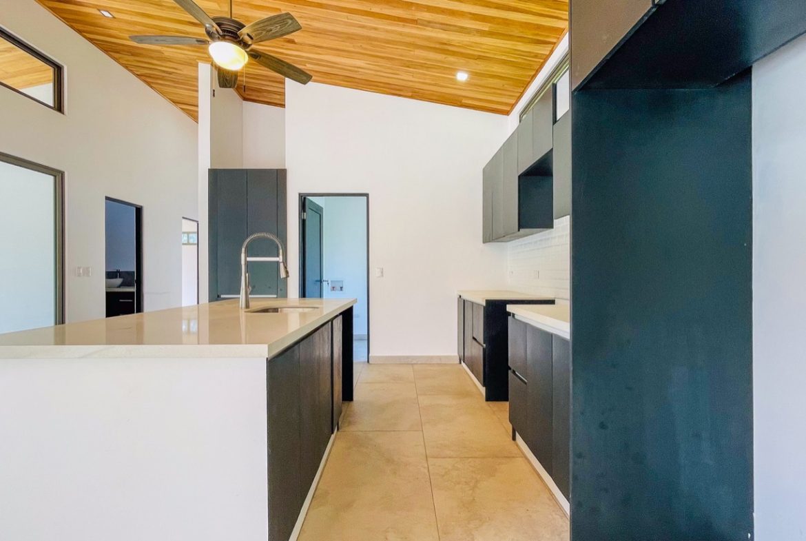 PROPERTY WITH THREE BEDROOM HOME IN A GATED COMMUNITY, IN OJOCHAL – 0.25 ACRES